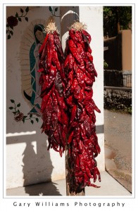 Photograph of red chile ristras near Chimayo, New Mexico